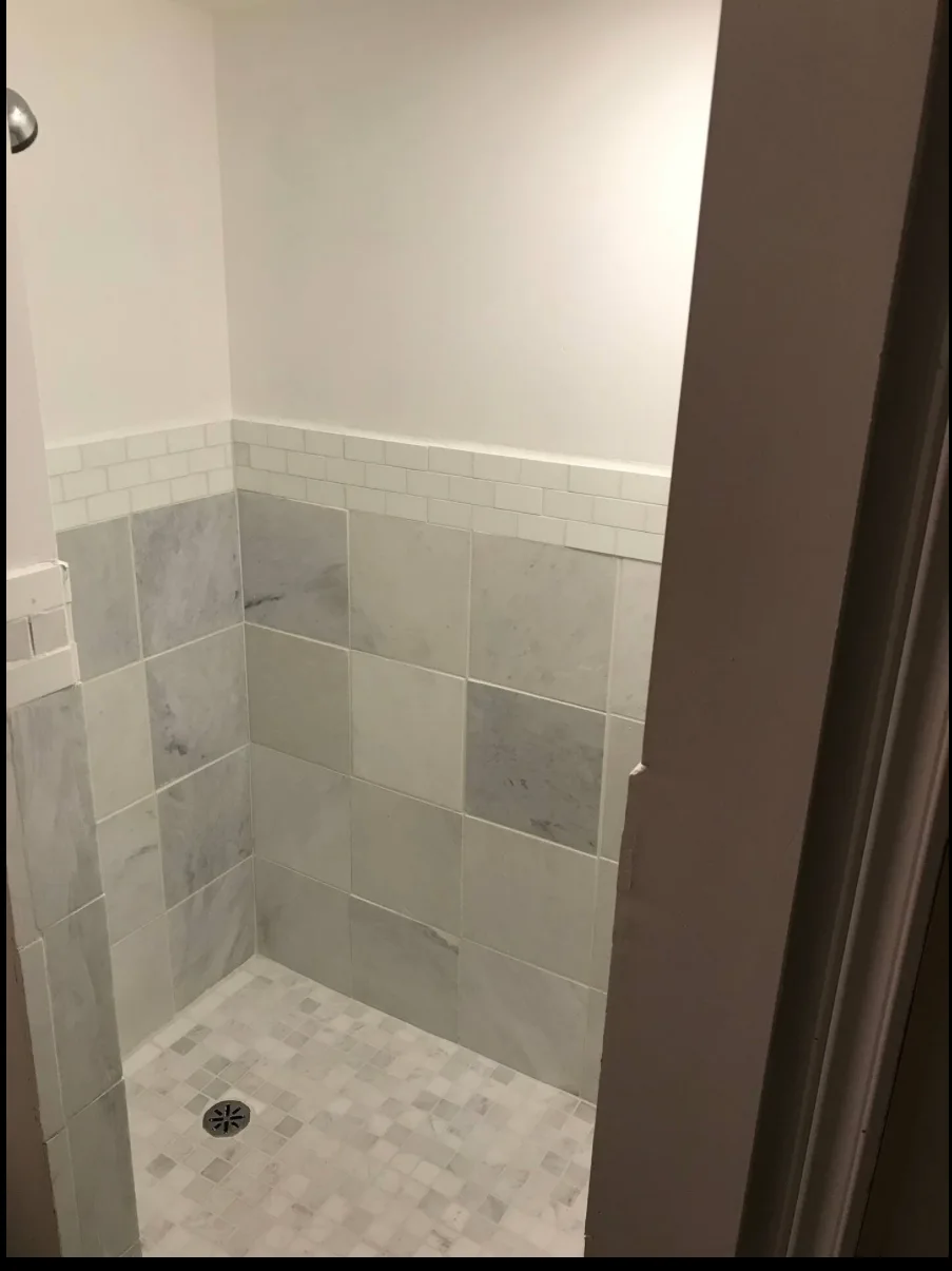 Marble tile bathroom shower